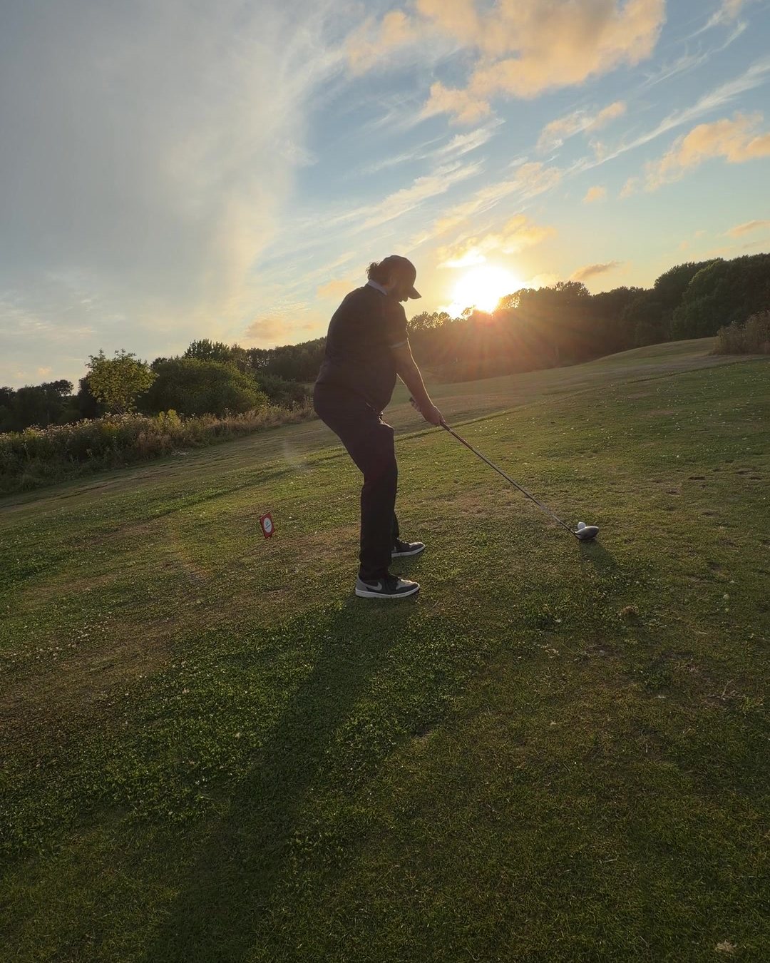 Simon on the tee at sunset